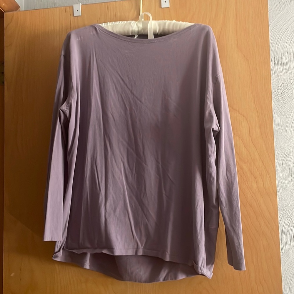 Purple Lululemon top! Unsure of size. Probably a 6-8.